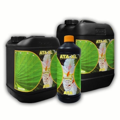 Embalagens pretas de produto ATA-XL com etiqueta verde e amarela com flor