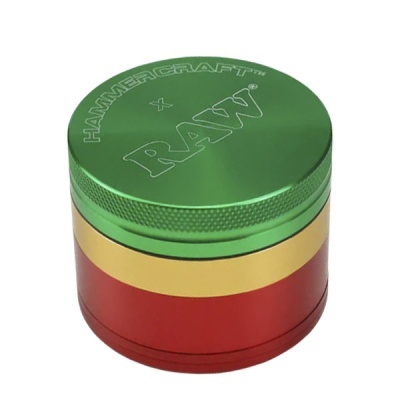 Triturador metálico verde, amarelo e vermelho com texto HAMMER CRAFT x RAW