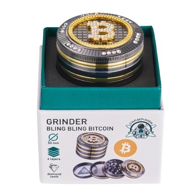Moedor Bitcoin com pedras decorativas dentro de embalagem