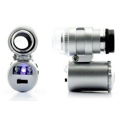 Microscópio portátil prateado com luz LED azul