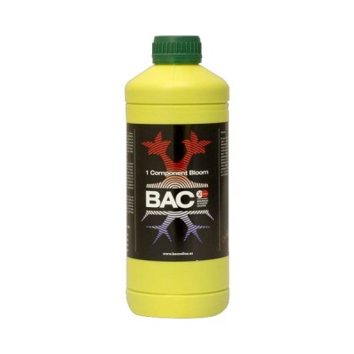 Frasco amarelo com tampa verde e etiqueta preta com texto e padrão colorido