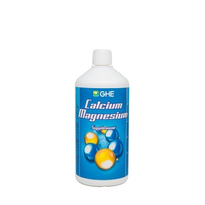 Frasco branco de suplemento Calcium Magnesium com etiqueta azul e esferas coloridas