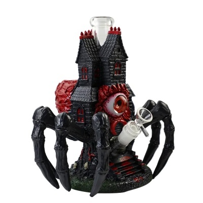Objeto decorativo ou bong em forma de aranha com castelo e olhos