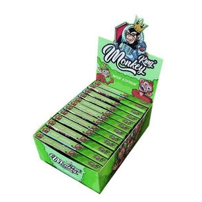 Caixa verde com embalagens King Monkey WILD EDITION com desenhos de macacos