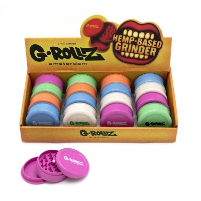 Moinho de cânhamo G-Rollz em várias cores numa caixa amarela