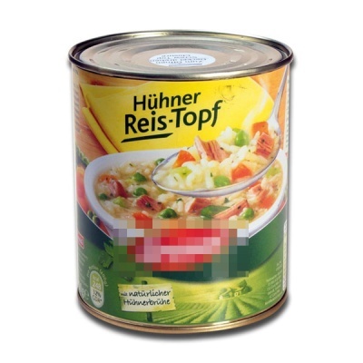 Lata metálica de sopa de arroz e frango com rótulo colorido e texto em alemão