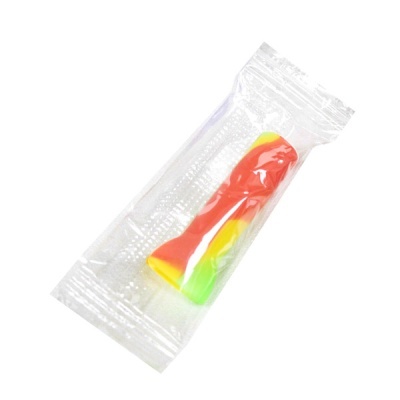 Doce tipo gomas multicolor em embalagem plástica transparente