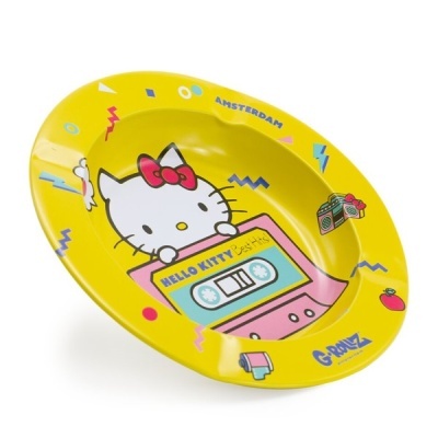 Cinzeiro amarelo com Hello Kitty e fita cassete rosa e azul