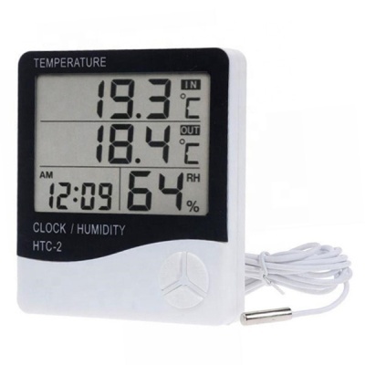 Termómetro digital branco com ecrã LCD a mostrar temperatura e humidade