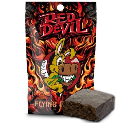 Embalagem colorida com design de chamas e um burro amarelo sorridente, texto RED DEVIL, bloco escuro ao lado.