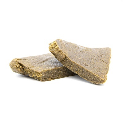 Blocos sólidos triangulares castanhos claros com textura granulada