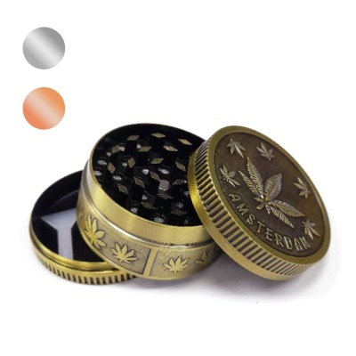 Triturador metálico dourado com folhas e escrita AMSTERDAM