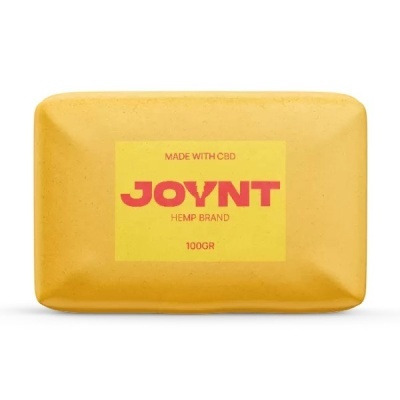 Barra de sabão amarela com etiqueta JOYNT HEMP BRAND