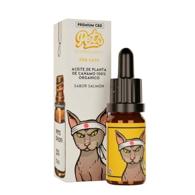 Frasco e embalagem de óleo para gatos com ilustração de gato e texto em castelhano