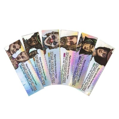 Embalagens coloridas de papel para enrolar com desenhos de personagens de circo e texto Rolling Circus