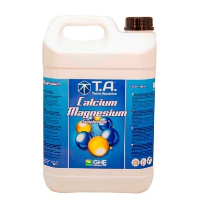 Recipiente branco com rótulo azul de suplemento Calcium Magnesium T.A.