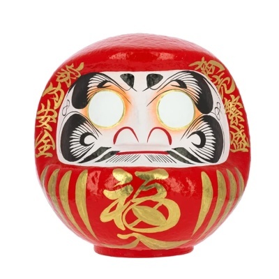 Máscara Daruma japonesa vermelha com detalhes dourados e pretos