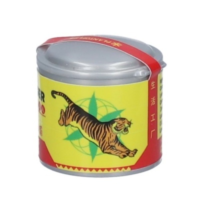 Lata pequena redonda com rótulo amarelo e vermelho com tigre e texto chinês