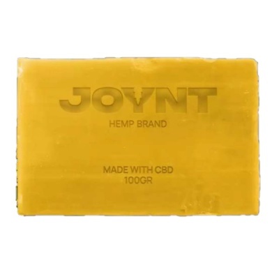 Sabão amarelo com texto gravado JOYNT HEMP BRAND MADE WITH CBD 100GR