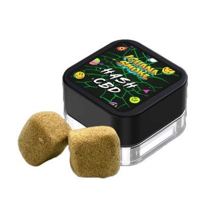Embalagem de hash CBD e duas peças de hash marrons