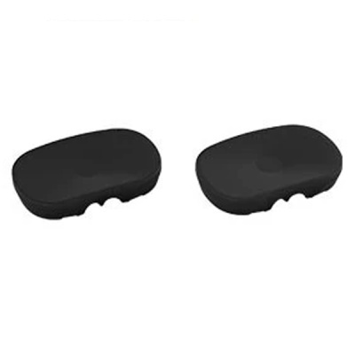 Dois objetos pretos ovais pequenos em fundo branco