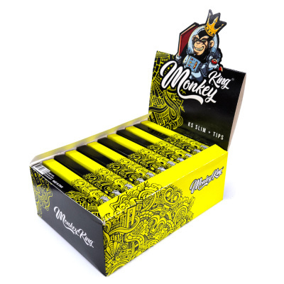Expositor de caixas de papel amarelo e preto Monkey King com desenho de macaco e texto KS SLIM + TIPS