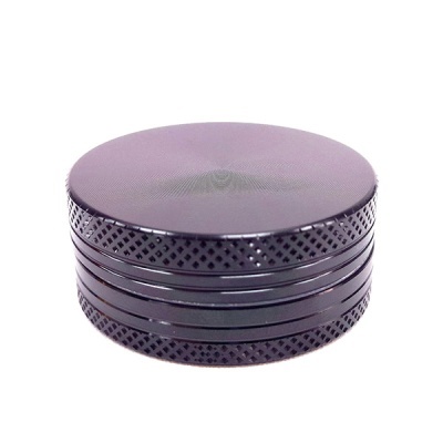 Triturador metálico roxo escuro com textura cruzada e topo liso