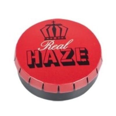 Embalagem redonda vermelha e preta com texto Real HAZE e uma coroa