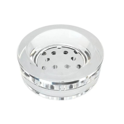 Cenicero redondo transparente com orifícios no centro