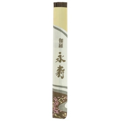 Pacote de incenso em vareta com embalagem amarela, branca e castanha com caracteres chineses.