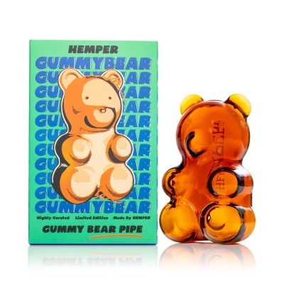 Peça de vidro âmbar em forma de urso com embalagem verde da Hemper