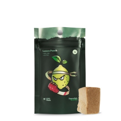 Pacote preto e verde com limão desenhado e bloco castanho ao lado