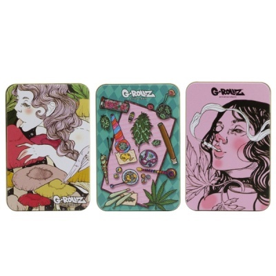 Três caixas metálicas G-ROLLZ com ilustrações coloridas variadas