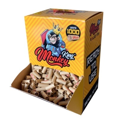 Caixa amarela com rolos de papel e ilustração de macaco com coroa