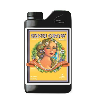 Frasco preto com rótulo amarelo e ilustração de mulher com flores no cabelo