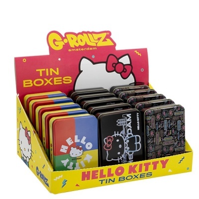 Expositor amarelo com caixas metálicas coloridas temáticas de Hello Kitty