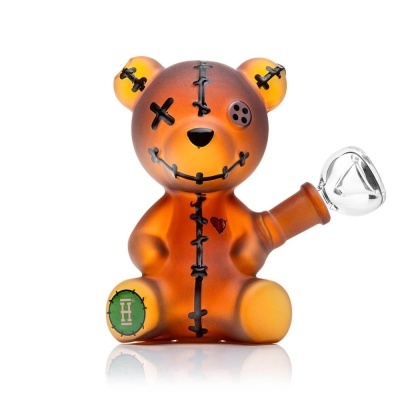 Figura de urso translúcido laranja com detalhes pretos e acoplamento de vidro transparente