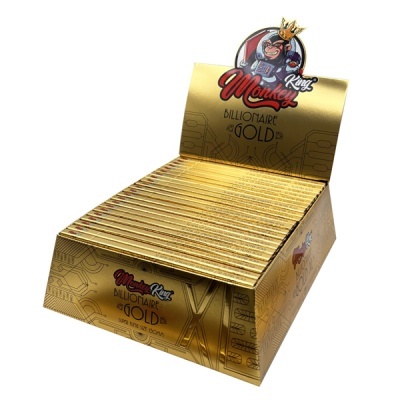 Expositor dourado com embalagens do produto Monkey King BILLIONAIRE GOLD