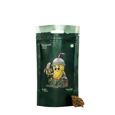 Embalagem preta com ilustração de banana amarela e flor de cannabis.
