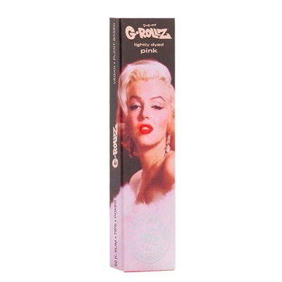 Embalagem de produto cosmético rosa claro com imagem de mulher loira e texto em inglês.