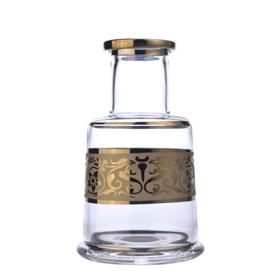 Garrafão de vidro transparente com decoração dourada e preta