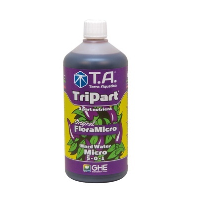 Frasco de fertilizante líquido T.A. Terra Aquatica Tripart FloraMicro com rótulo roxo e amarelo
