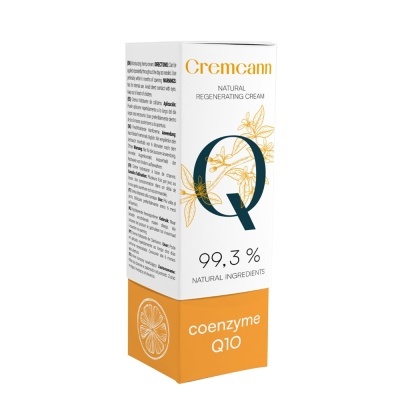 Embalagem branca e laranja de creme regenerador natural com coenzima Q10 e ilustração de flores