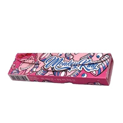 Embalagem rosa com desenho de olhos e macaco, texto Monkey King azul e branco