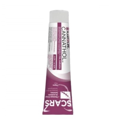 Tubo de creme branco e roxo com texto CANINATHOL e SCARS.