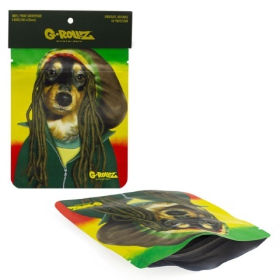 Pacote e saco colorido reutilizável com imagem de cão com dreadlocks em fundo verde, amarelo e vermelho.