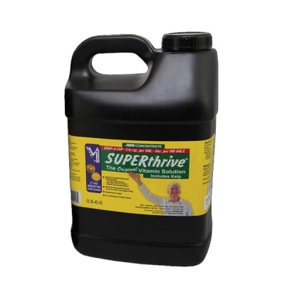 Recipiente preto de plástico com etiqueta amarela e texto SUPERthrive