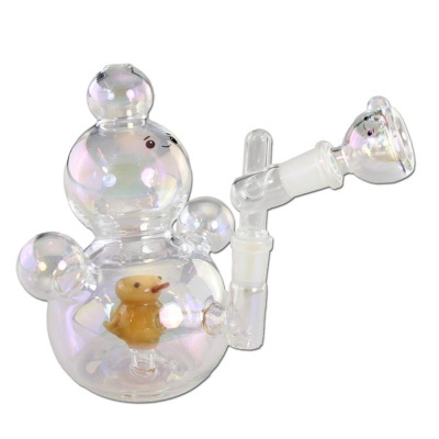 Peça de vidro transparente em forma de urso com patinho amarelo dentro