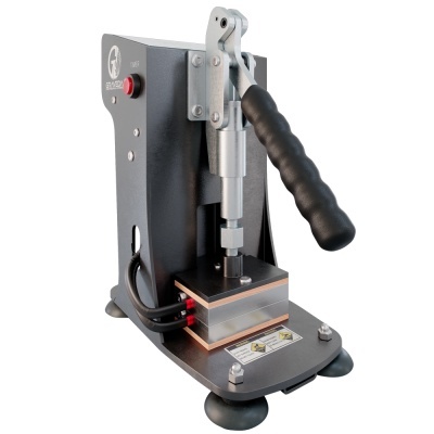 Máquina manual de tampografia cinza e preto com alavanca preta e base com ventosas