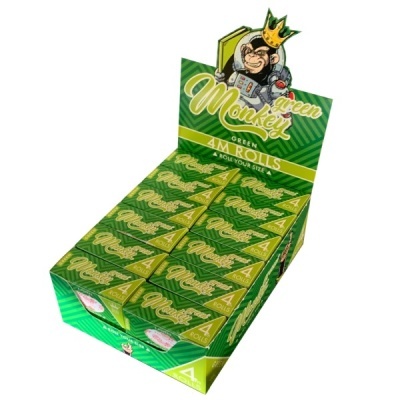 Expositor verde com embalagens verdes chamadas Monkey green 4M ROLLS contendo imagem de macaco com coroa